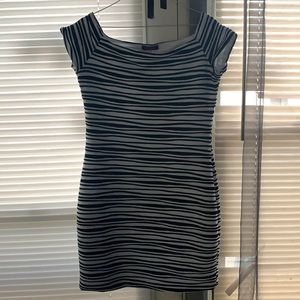 Black and white tight fitting dress.